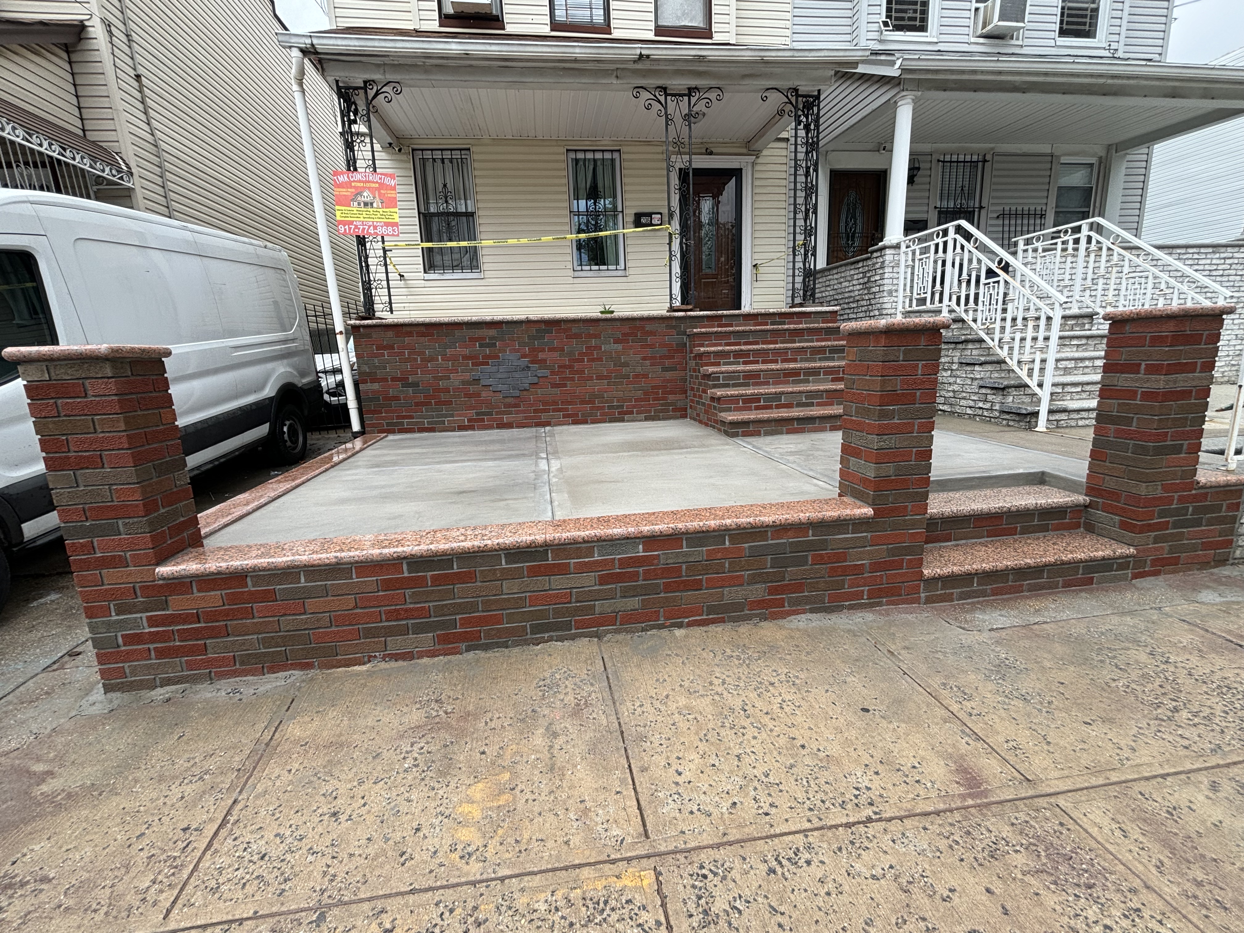Custom brick porch with steps and pillars