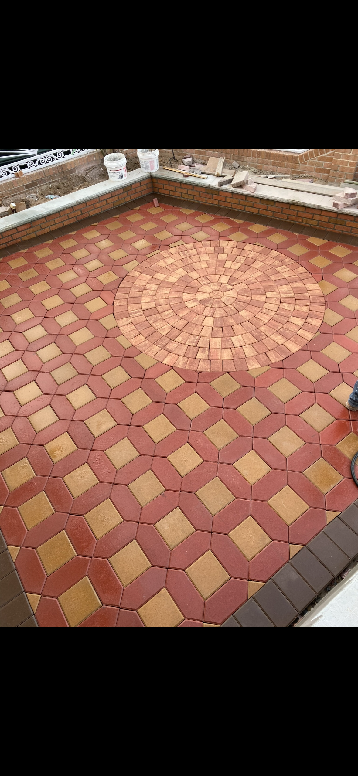 Decorative pavers with circular center