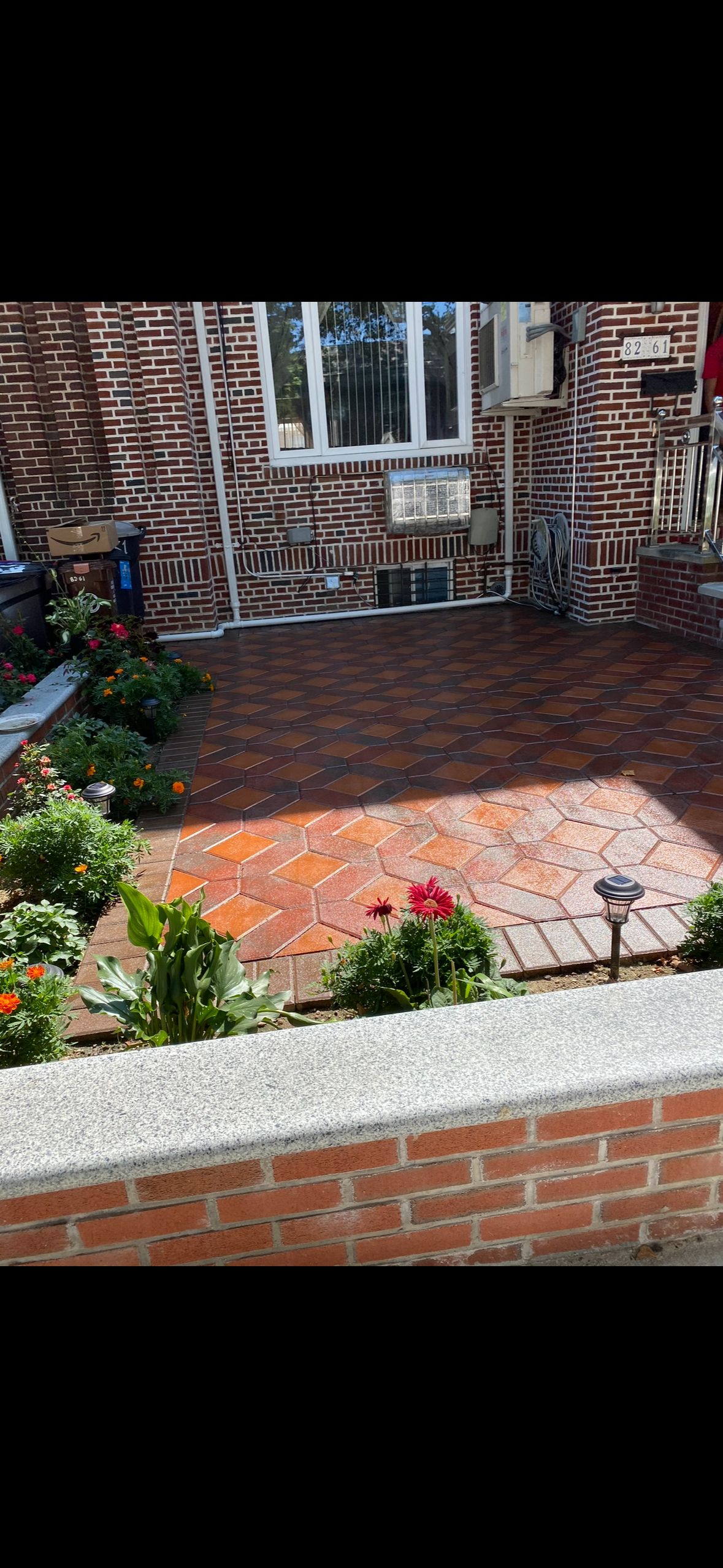 Hexagonal paver patio with garden