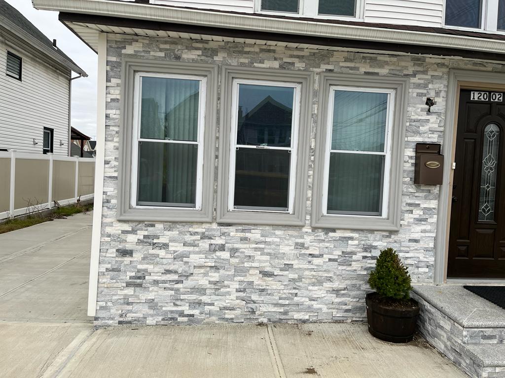 Modern stone veneer exterior on house front