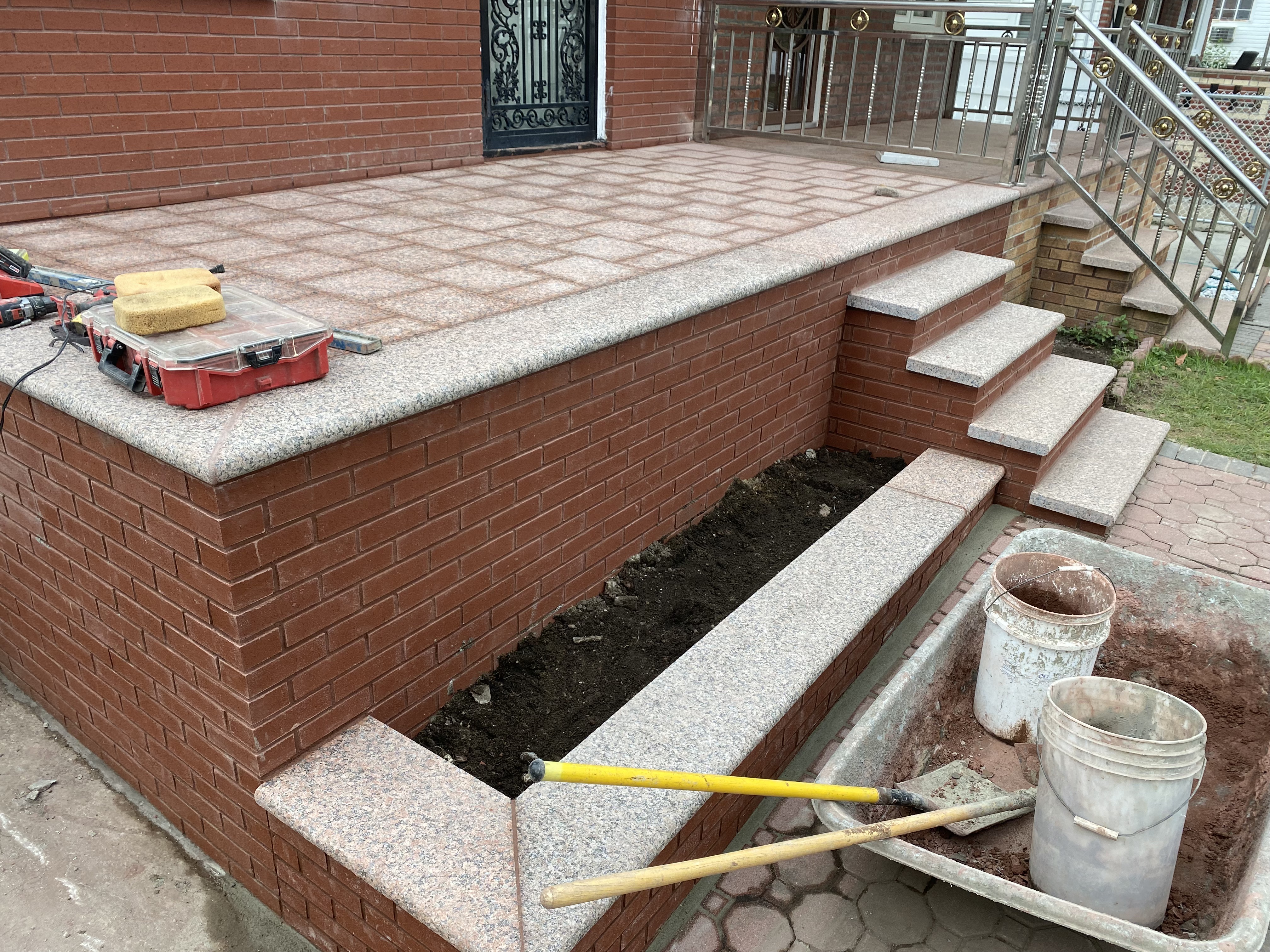 Brick porch with granite top in progress