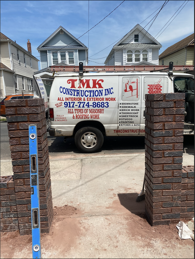 TMK Construction company van